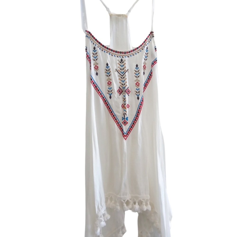 Bohemian embroidered woman's white tank top with fringe trim